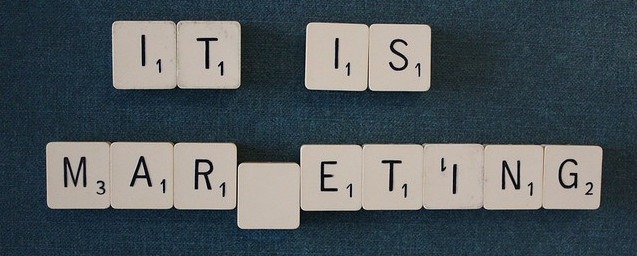 Image is of scrabble tiles that read as 'it is marketing '
